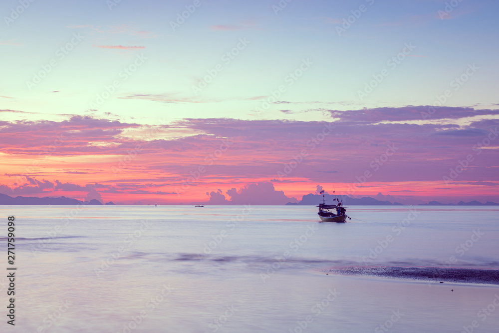 Panoramic beaytiful tropical  purple sea sky sunset with golden light background ,long exposure