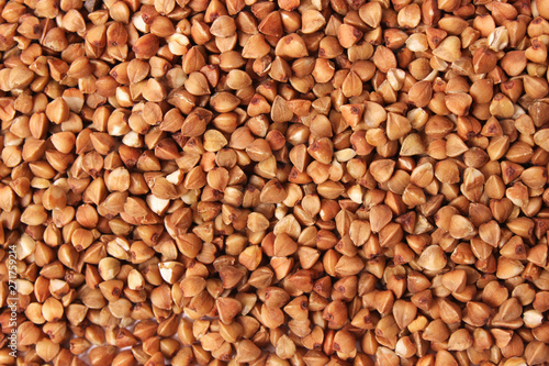 raw buckwheat background top view.