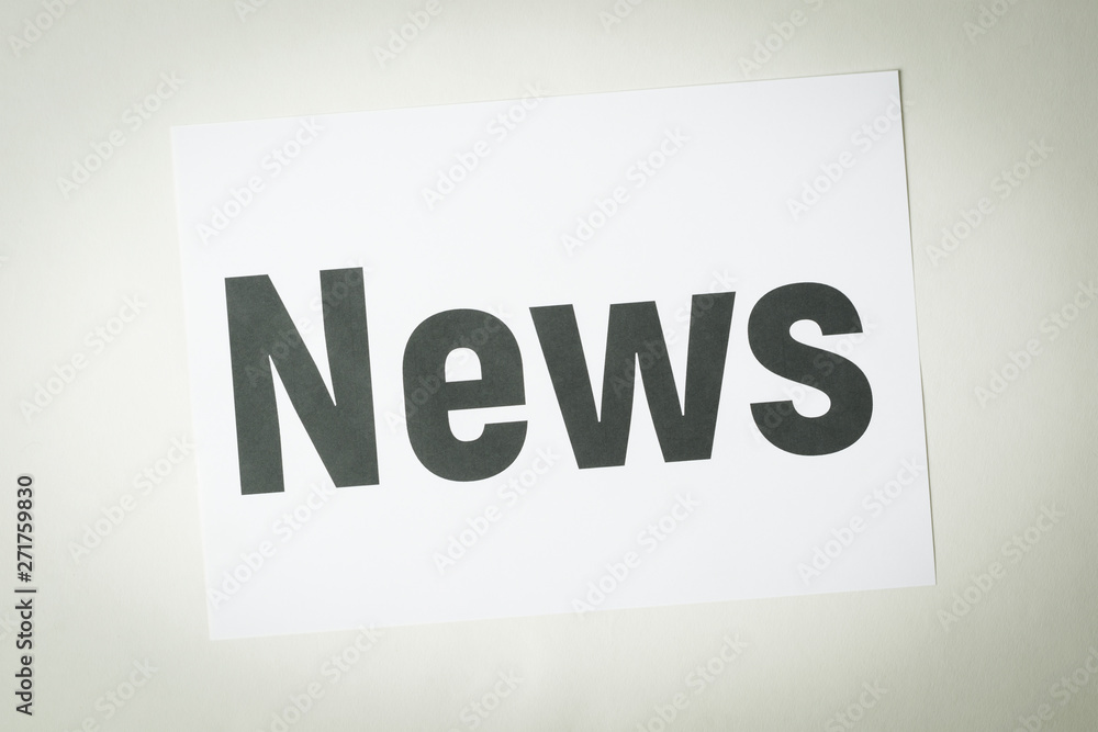 NEWS inscription on white paper NEWS inscription on white paper
