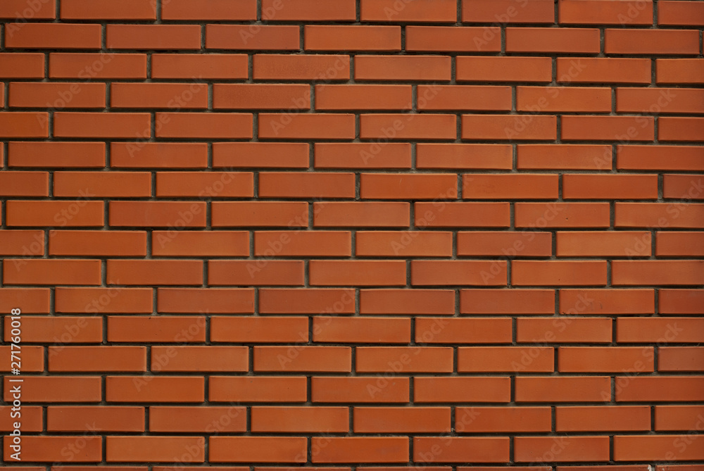 Red monochrome brick wall texture background Red monochrome brick wall texture background