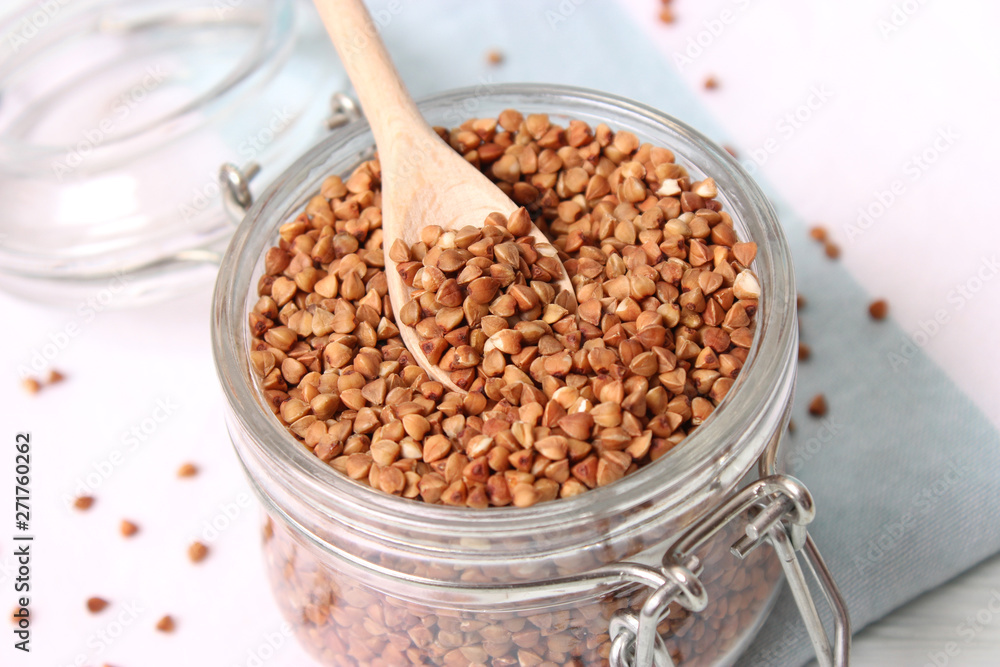 raw buckwheat on a colored background. raw buckwheat on a colored background.