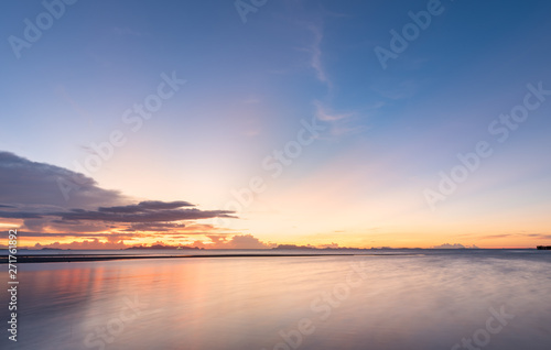 Panoramic dramatic blue sea sky sunset with golden light background,long exposure