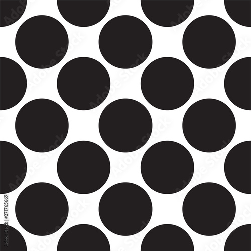 White background with black circles. Seamless black and white vector decorative background with polka dots. Classic style. Flat design