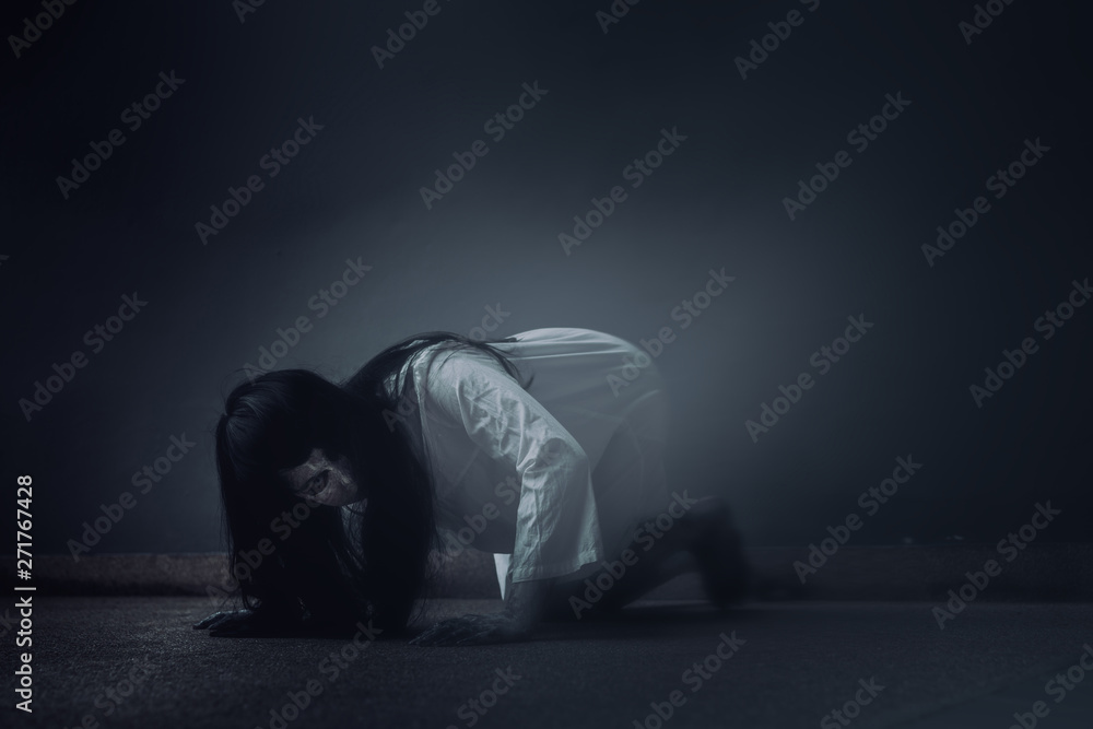 Ghost Woman Horror scene Death movie with Halloween Makeup lying on Floor in Darkroom. - obrazy, fototapety, plakaty 