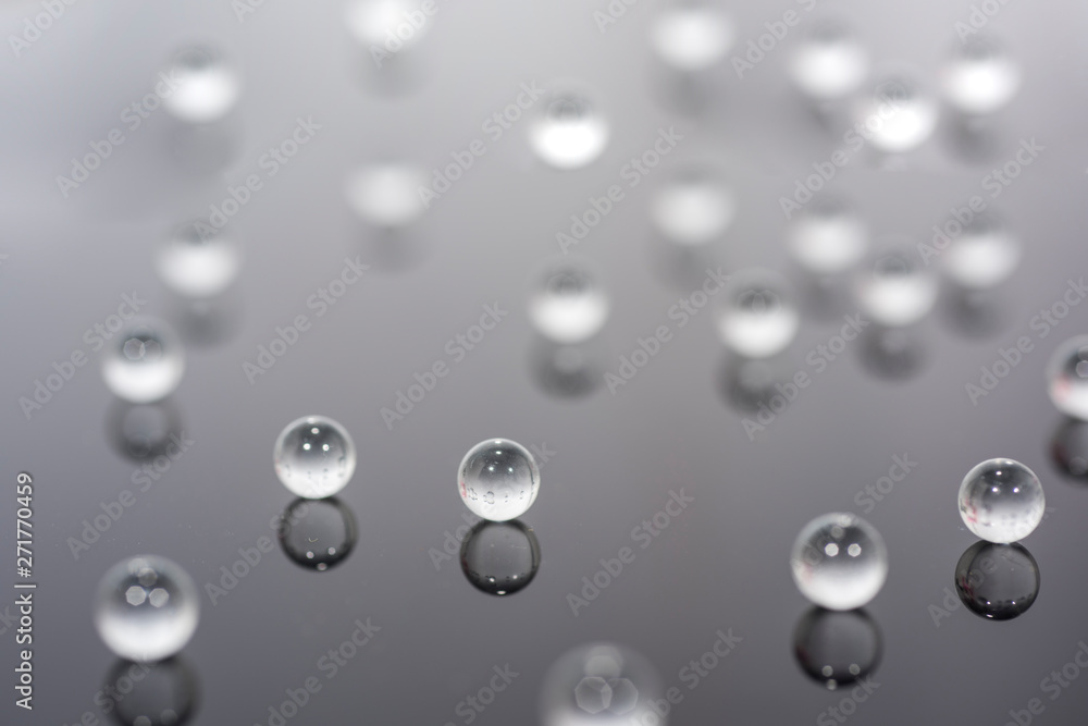 Abstract photo with small glass balls on transparent background. Abstract photo with small glass balls on transparent background.