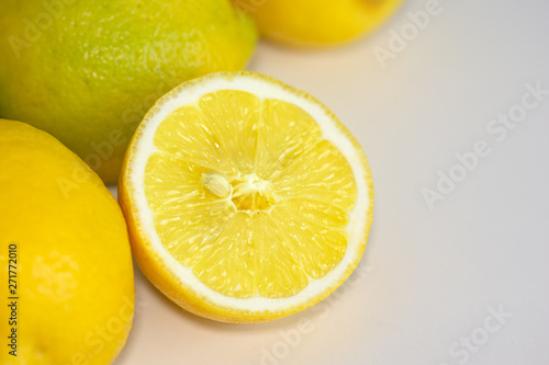 Freshly sun drenched lemons, on background Bokeh.