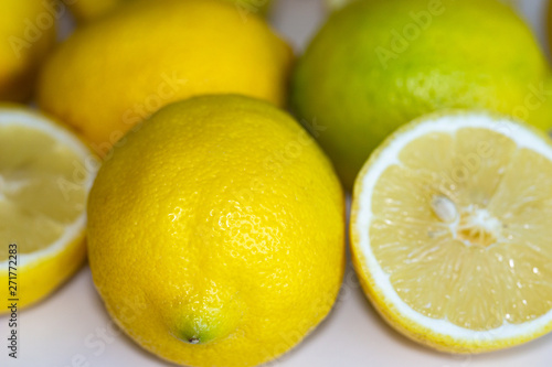 Freshly sun drenched lemons, on background Bokeh.