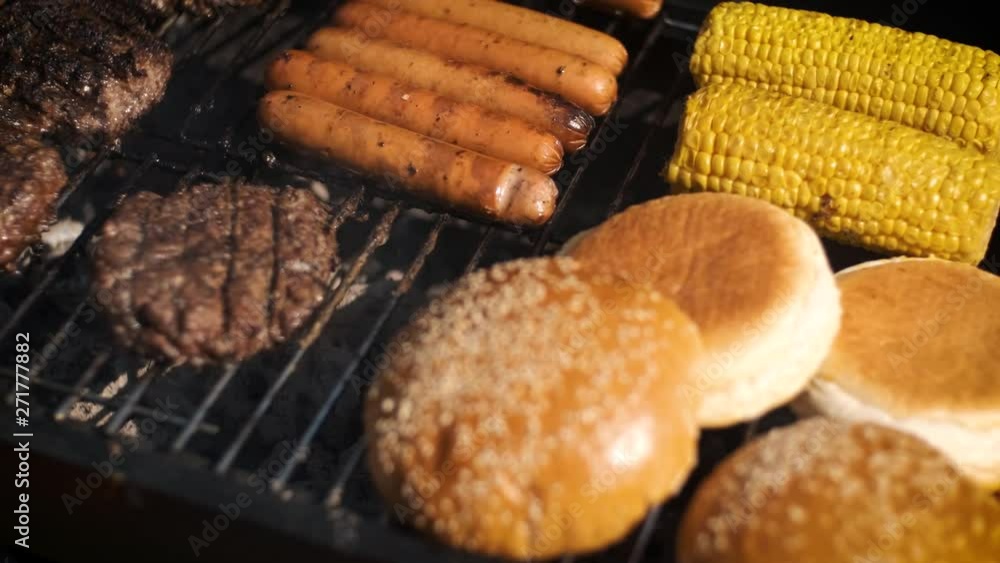 Mixed american barbecue food on hot grill Mixed american barbecue food on hot grill