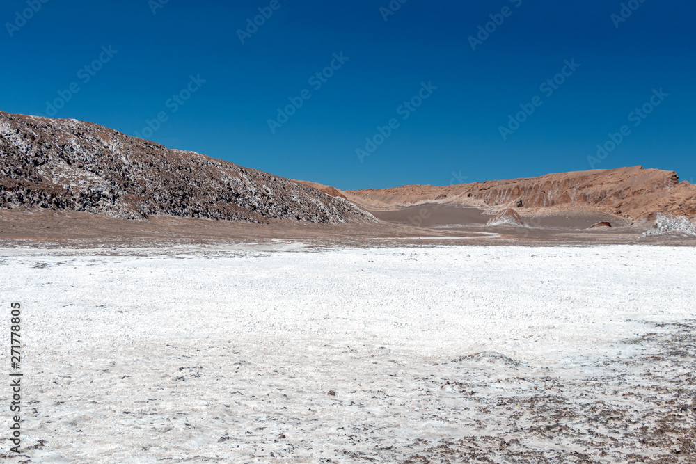 The Moon Valley area (Valle de la Luna) of geological formation of stone and sand located in the Salt mountain range, Atacama desert, Chile The Moon Valley area (Valle de la Luna) of geological formation of stone and sand located in the Salt mountain range, Atacama desert, Chile