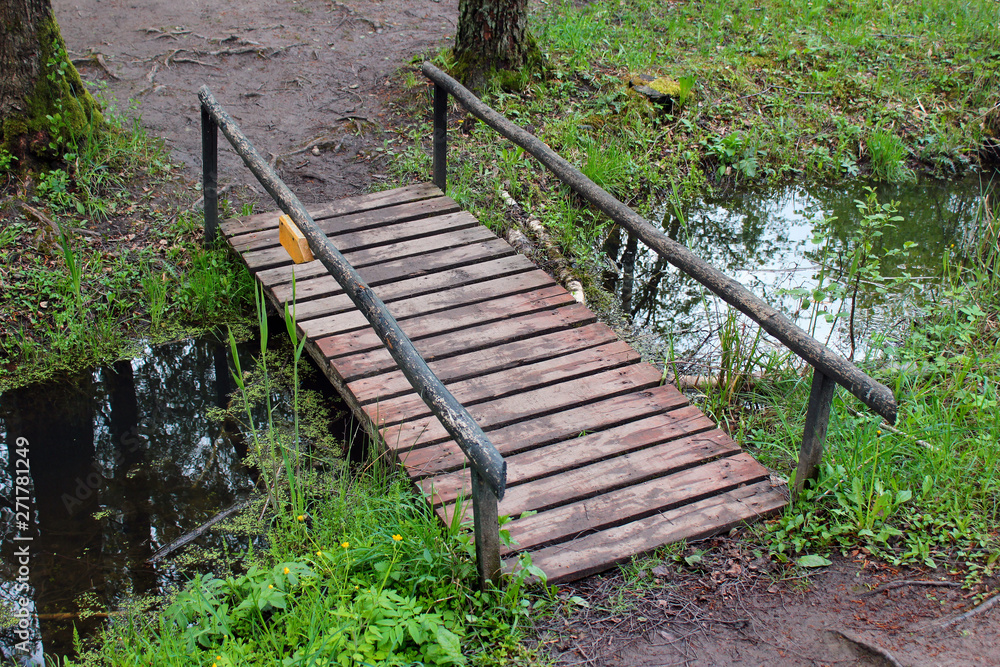 Small wooden bridge in a forest Small wooden bridge in a forest