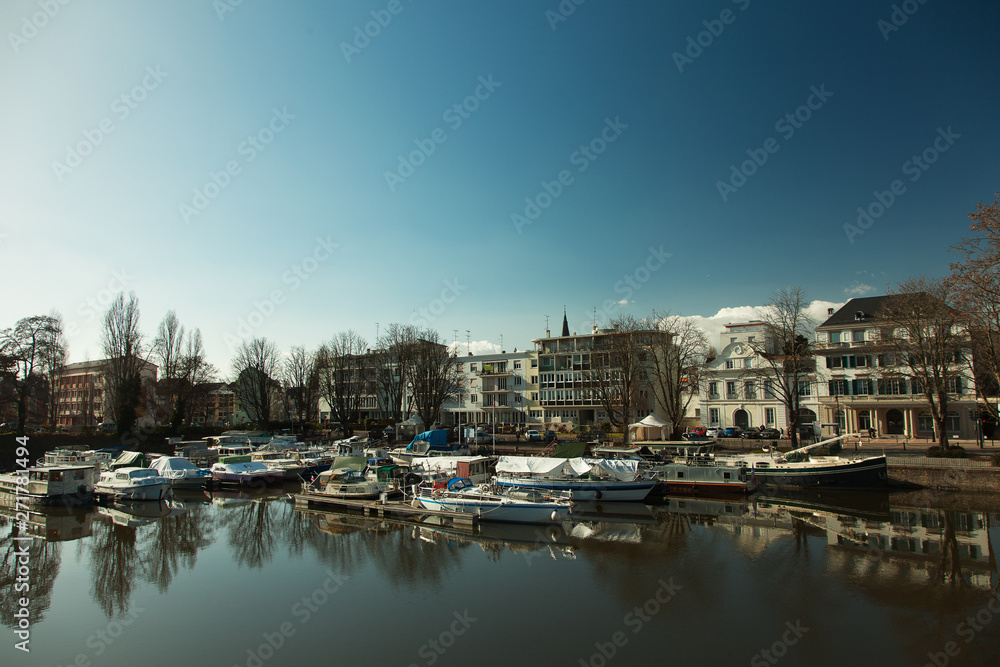 Alsace, Mulhouse, canal with boats, cityscape