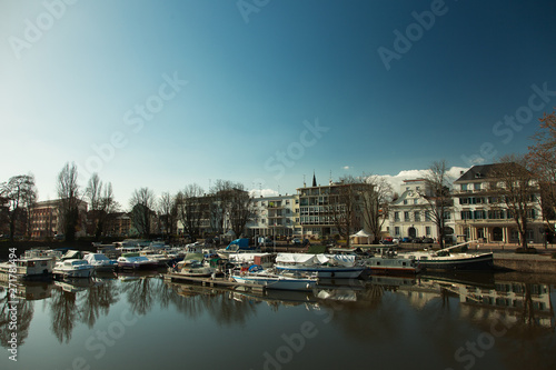 Alsace, Mulhouse, canal with boats, cityscape © Gladcov Vladimir