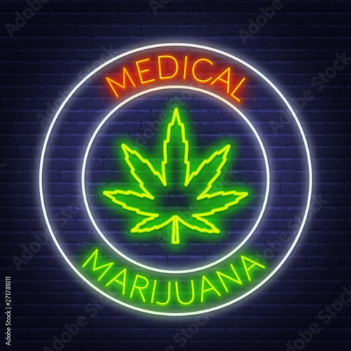 Medical marijuana neon sign on the brick wall background. Vector.