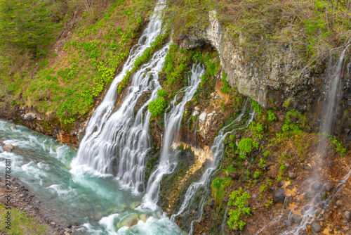 Shirahige-no-taki Waterfalls and the Tokachi river in Biei  Hokkaido  Japan