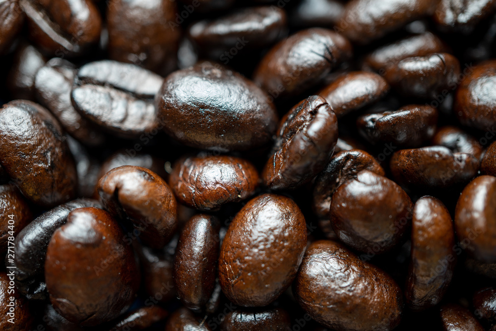 Close up of group black coffee beans. Strong black espresso, Grains of coffee background, texture Close up of group black coffee beans. Strong black espresso, Grains of coffee background, texture