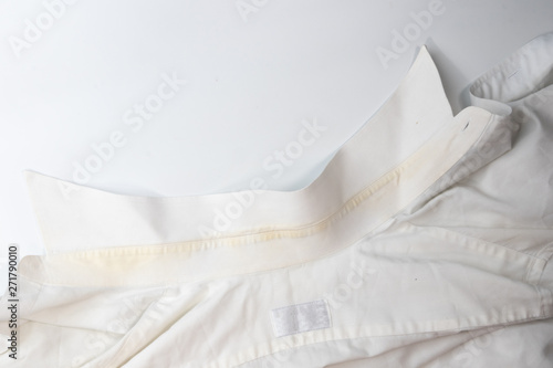 yellow dirty stain on white collar shirt