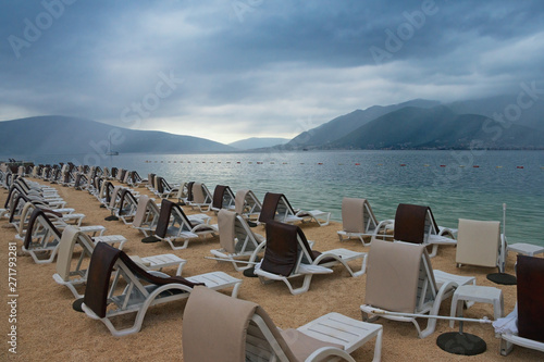 Cloudy summer day on the beach.  Montenegro  Adriatic Sea  view of Bay of Kotor near Tivat city