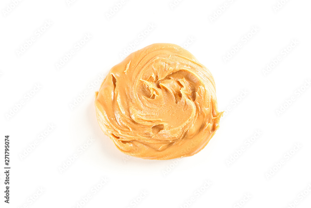 Creamy peanut butter isolated on white background, top view. A traditional product of American cuisine Creamy peanut butter isolated on white background, top view. A traditional product of American cuisine