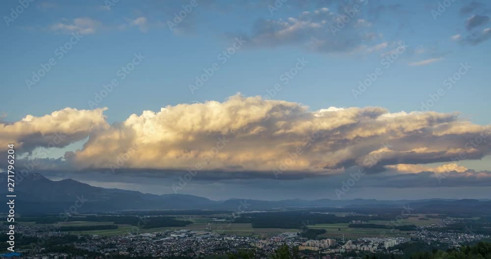 Timelapse of yellow colored clouds gathering and casting shadow on the city of Kranj bellow. Timelapse of yellow colored clouds gathering and casting shadow on the city of Kranj bellow.