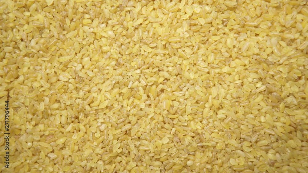 Bulgur wheat cereal food as background. Top view. Healthy diet Bulgur wheat cereal food as background. Top view. Healthy diet