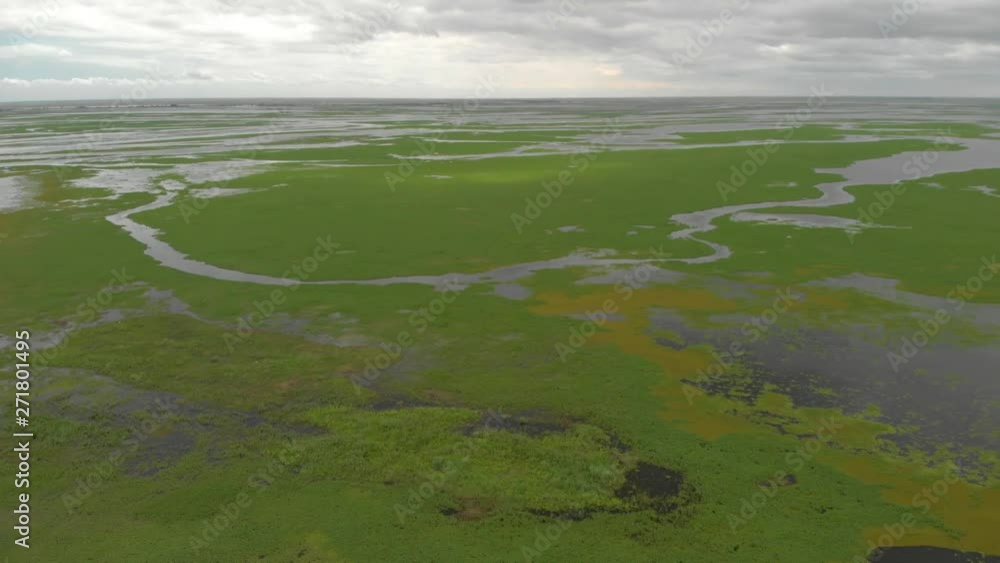 Wide, aerial shot of beautiful rivers in Entre Rios, province of Argentina. Cloudy midday. Wide, aerial shot of beautiful rivers in Entre Rios, province of Argentina. Cloudy midday.