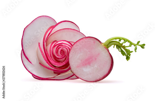 Elegant rose from radish slices and half of radish with green tops on a neutral white background