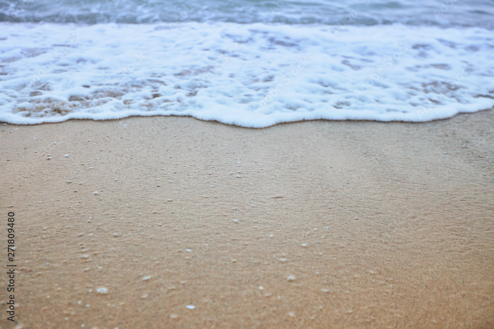 Fine beach and wawes under the summer sun as background Fine beach and wawes under the summer sun as background