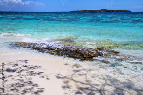 Sandy beach at Gee island in Ouvea lagoon  Loyalty Islands  New Caledonia