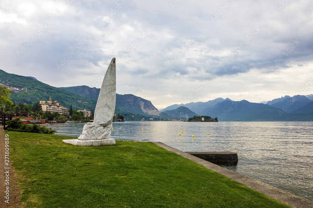 Stresa coast, Lombardy, Italy. Maggiore lake, town monument.