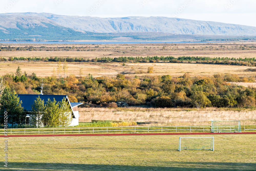 Φωτογραφία Landscape aerial high angle view of house and soccer field during day on golden