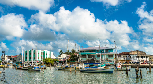 Houses and yachts at Haulover Creek in Belize City photo