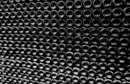 Wine bottles in the cellar. Wine cellar at the factory.