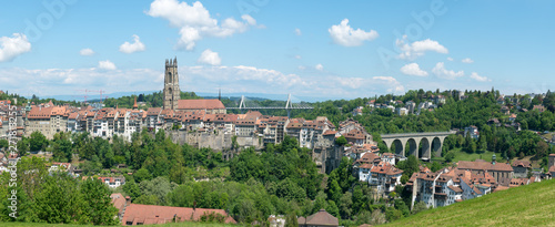 panorama view of the historic Swiss city of Fribourg with its old town and many bridges and cathedral photo