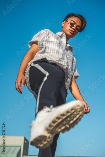 low angle photography of person wearing black sunglasses