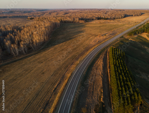 Aerial view of a road in su...