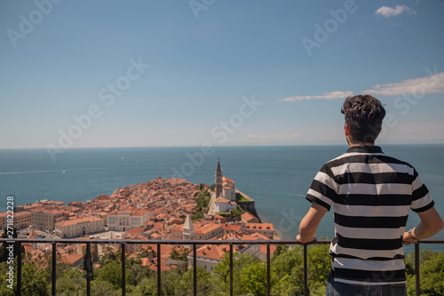man looking at the sea 