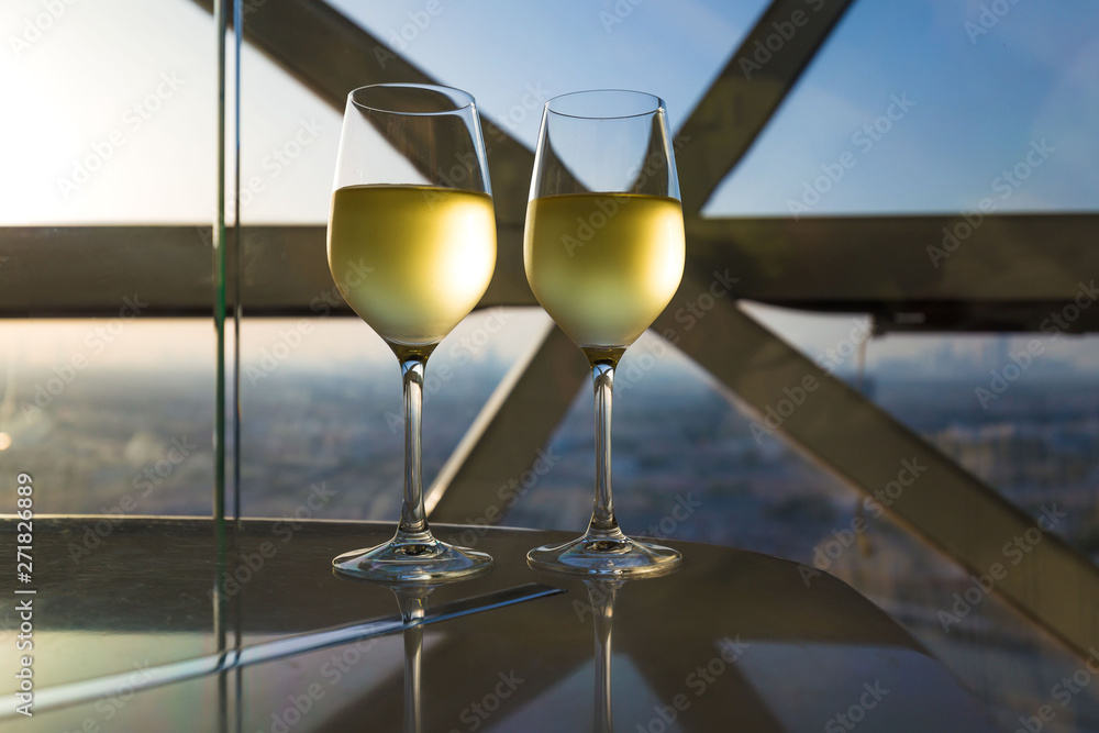 Obraz premium UAE. White wine in window background