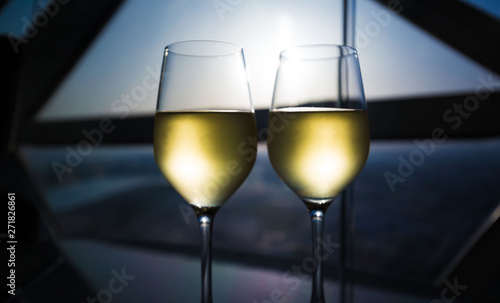 UAE. White wine in window background