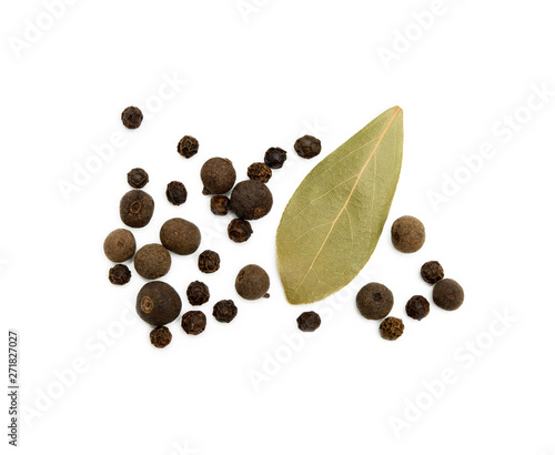 Bay leaf, allspice and pepper isolated on white background
