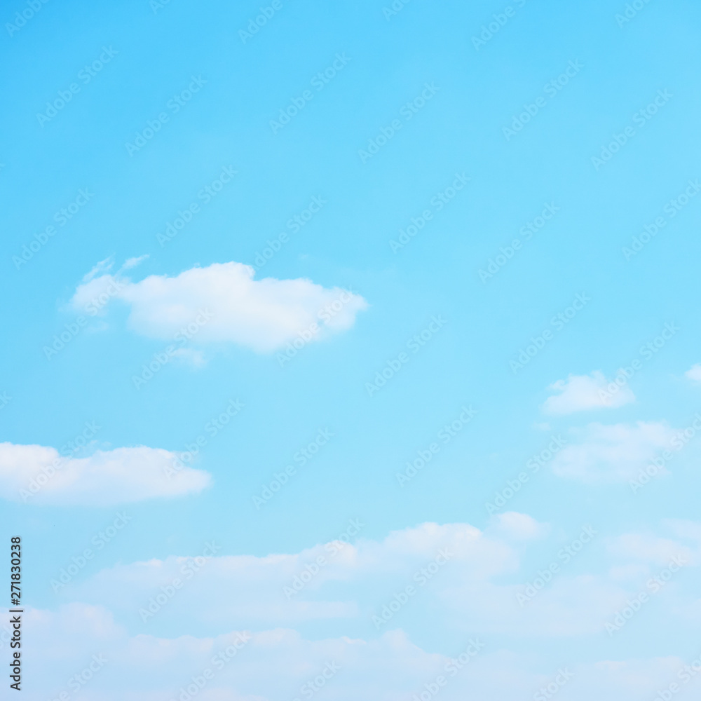 Cyan blue sky with clouds