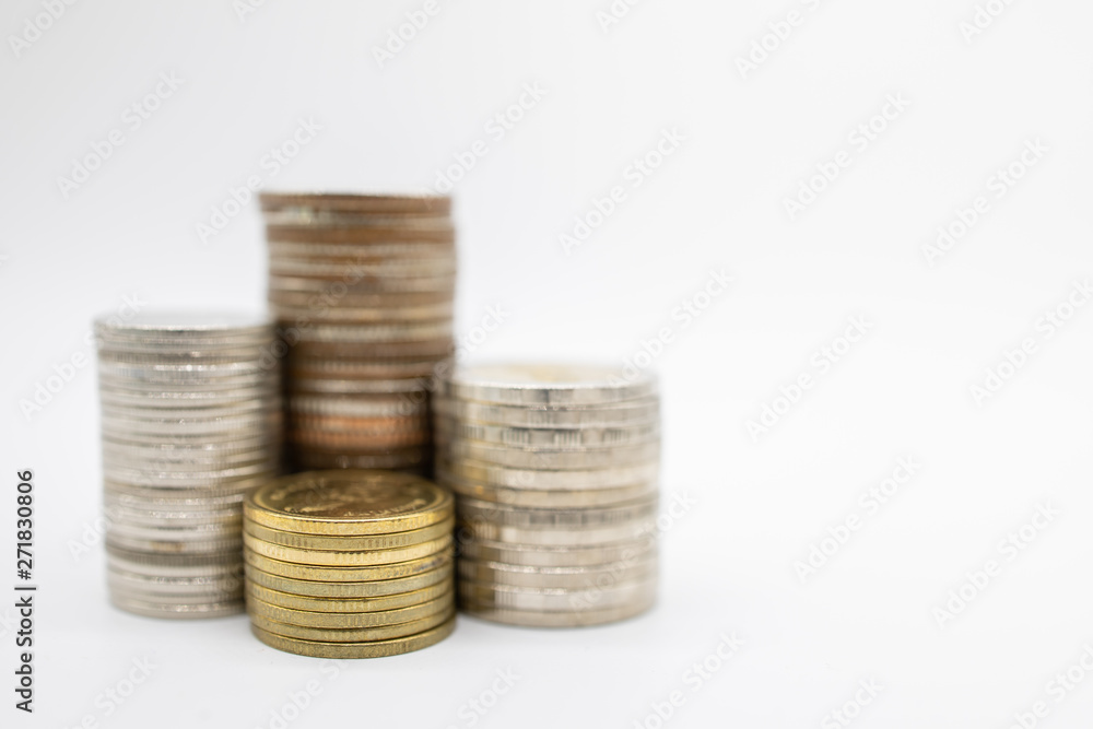 Business, saving and money concept. Close up of stack of man type of coins on white background. Business, saving and money concept. Close up of stack of man type of coins on white background.