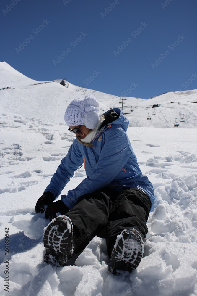 woman playing on the snow