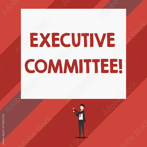 Writing note showing Executive Committee. Business concept for Group of Directors appointed Has Authority in Decisions Isolated view man standing pointing upwards two hands big rectangle