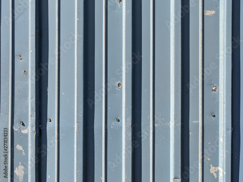 Blue peeling metal siding