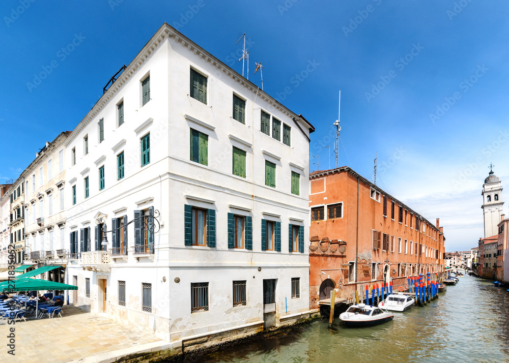 Venetian canal in sunny day. Italy.