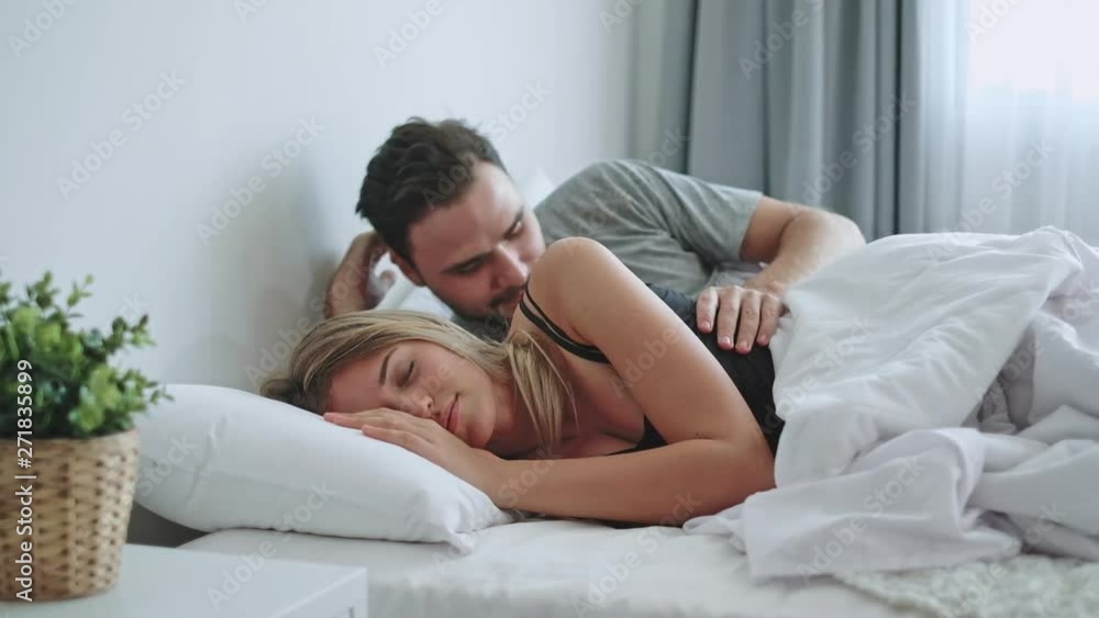 Happy couple lover on bed, hug and kiss in romantic time, love and passionate concept. Happy couple lover on bed, hug and kiss in romantic time, love and passionate concept.