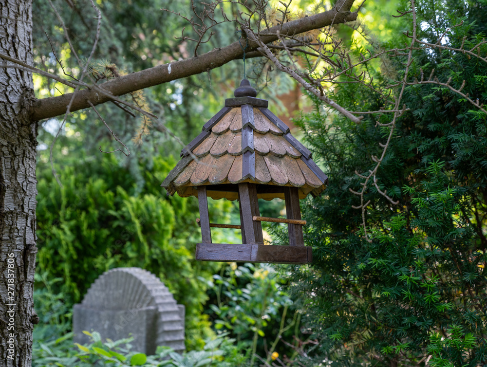 wooden house in the forest Vogelhaus auf dem Friedhof wooden house in the forest Vogelhaus auf dem Friedhof