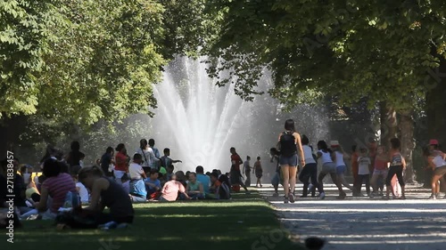 BRUSSELS, BELGIUM - SEPTEMBER 15, 2013: People recreation in the park on a summer hot day photo