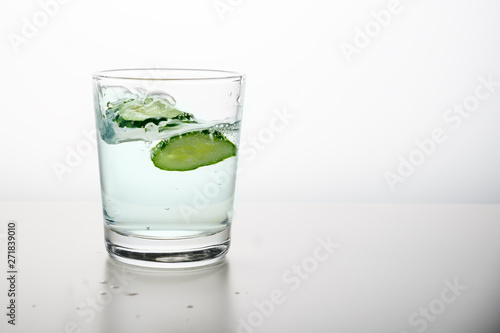 Minimalism. Clean water with cucumber with copy space. detox of the body