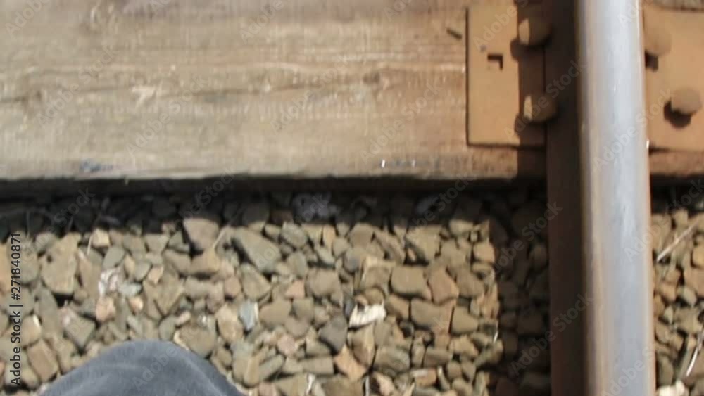 Feet walking on the railway, POV Feet walking on the railway, POV